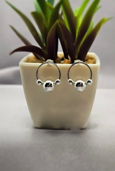 Sterling silver circle studs with three balls