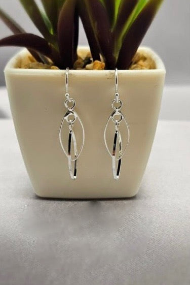 Double twist hanging earring