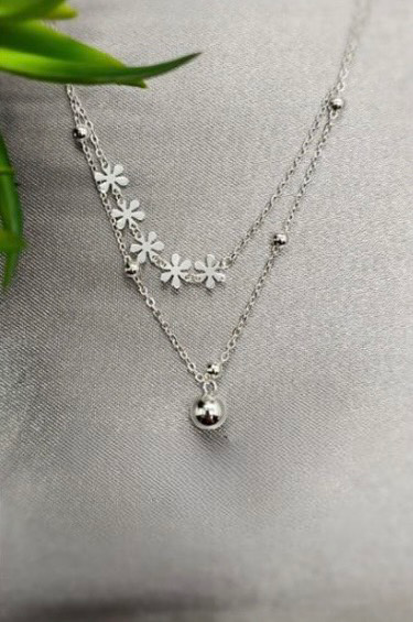 Sterling silver necklace with bal en flower detail