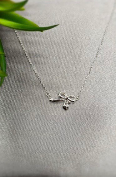 Little bow and heart necklace