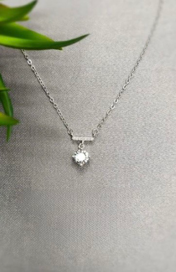 Cubic zirconia hanging from horizontal Bling tube