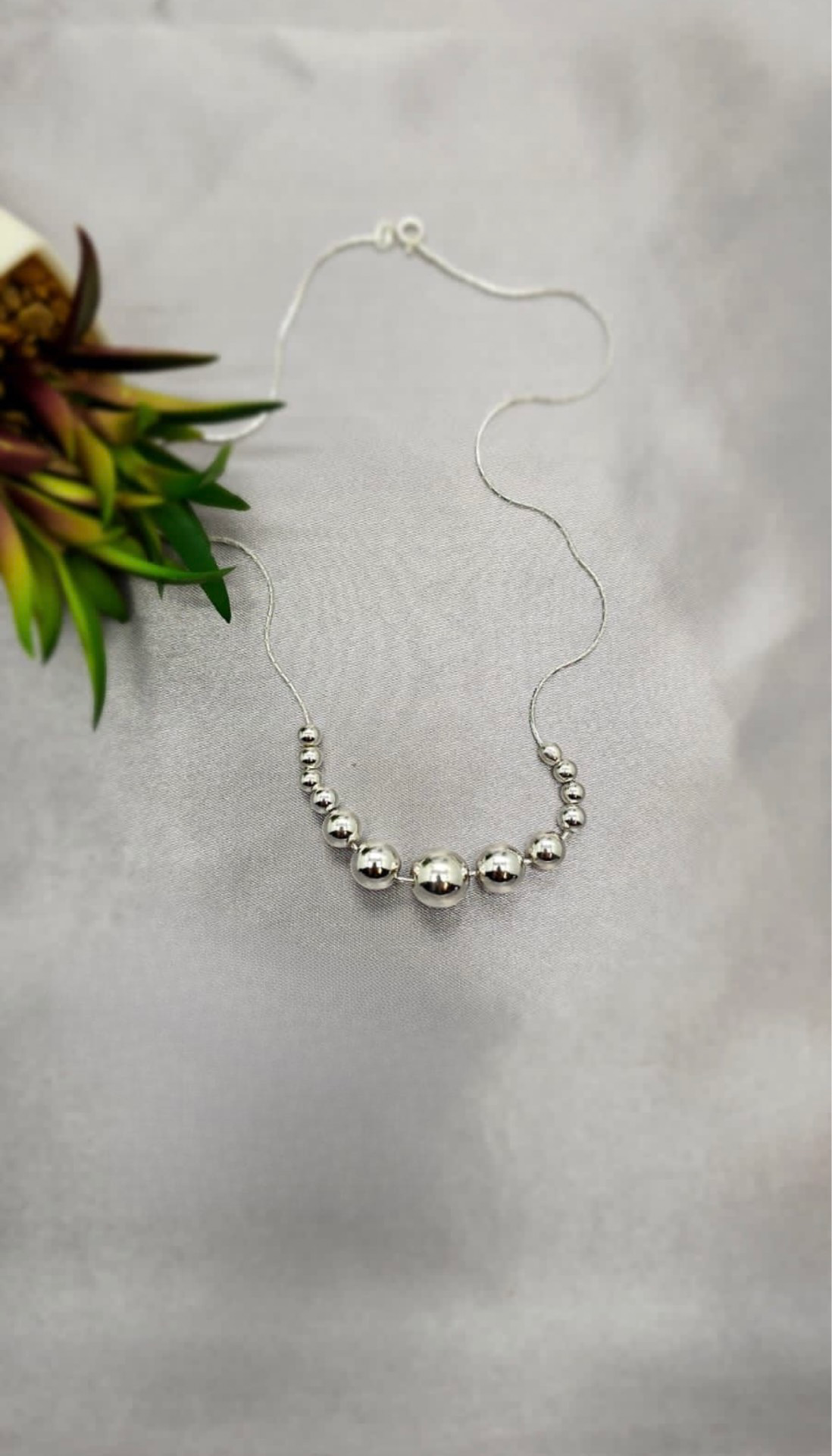 Necklace with 13 silver balls