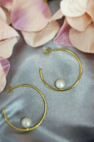 36mm gold plated on sterling silver hoops with stunning freshwater pearls on it