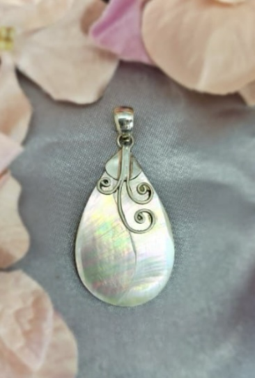 Sterling silver and shell pearl pendant with filigree detail on top