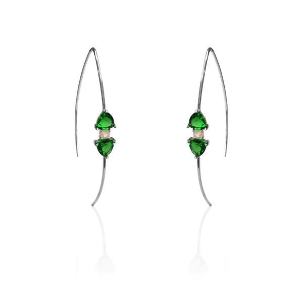 Pair of earrings with green gemstones on a white background