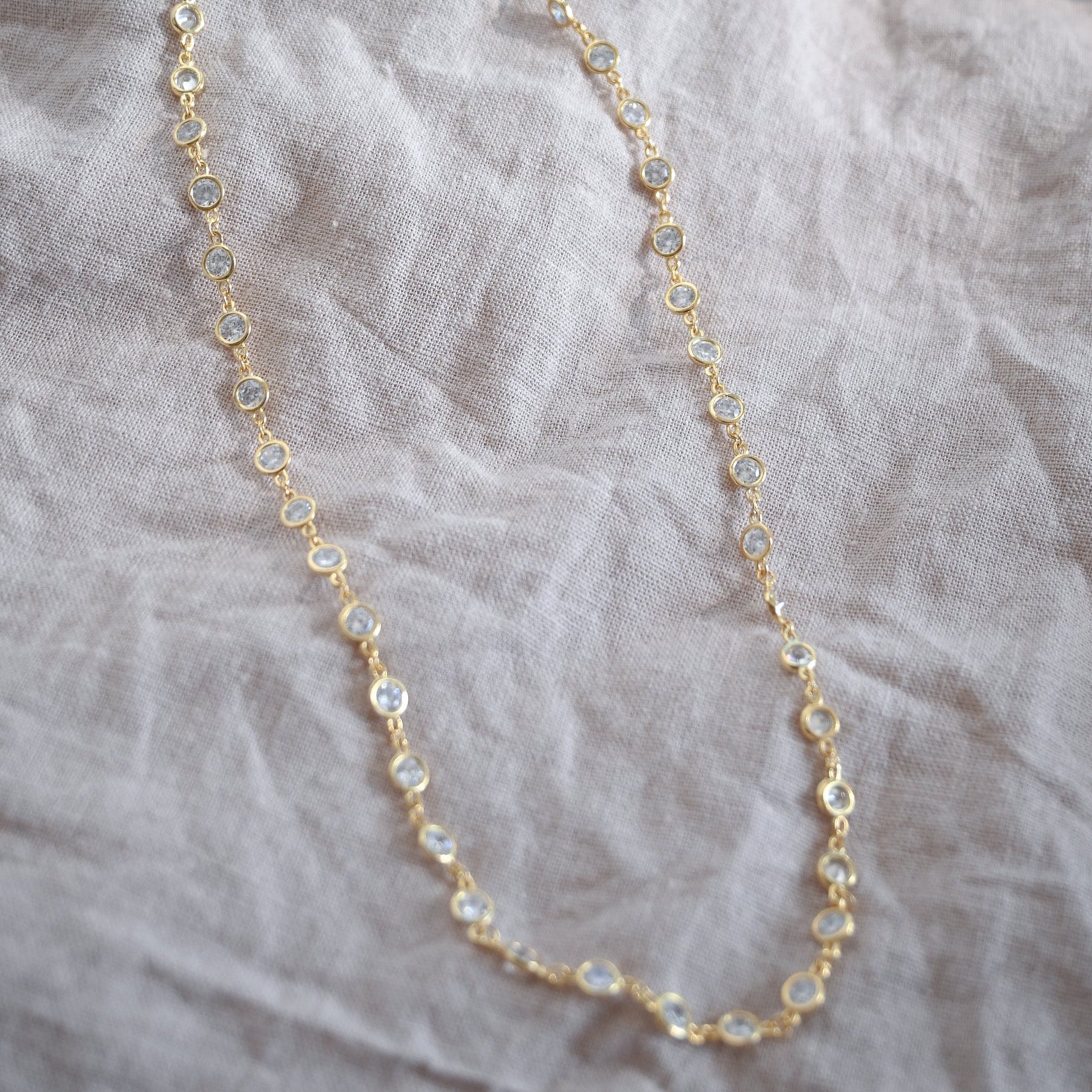 Gold necklace with cubic zirconia detail in chain