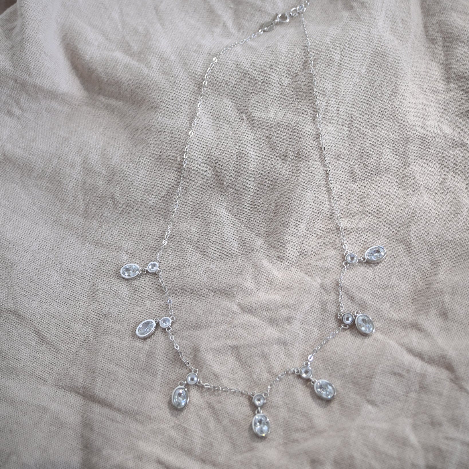 Dangly oval clear stone necklace