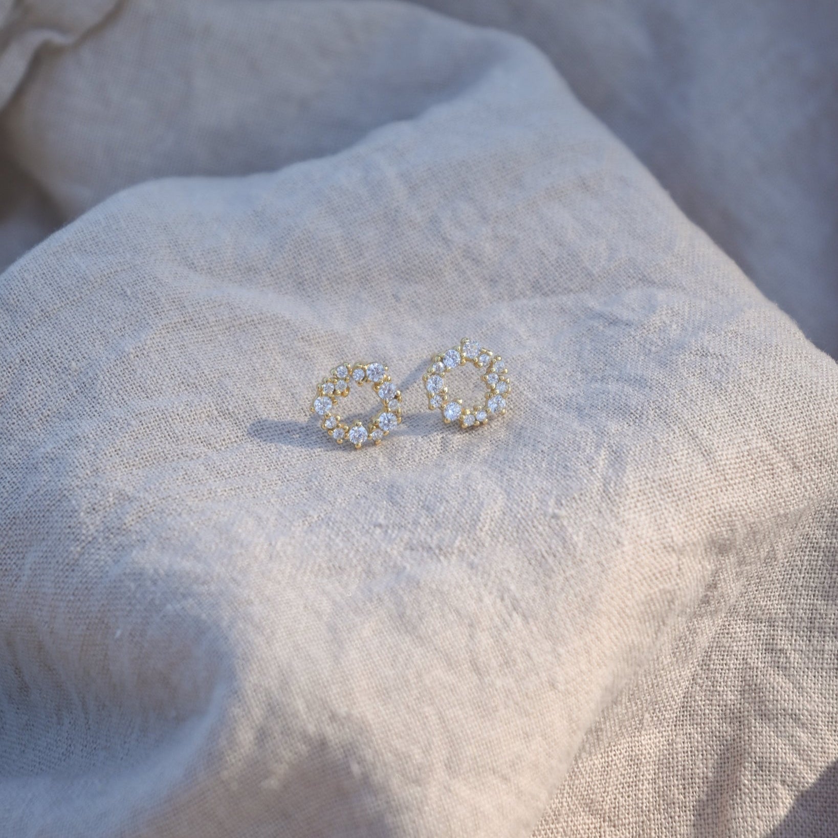 Gold circle stud earrings