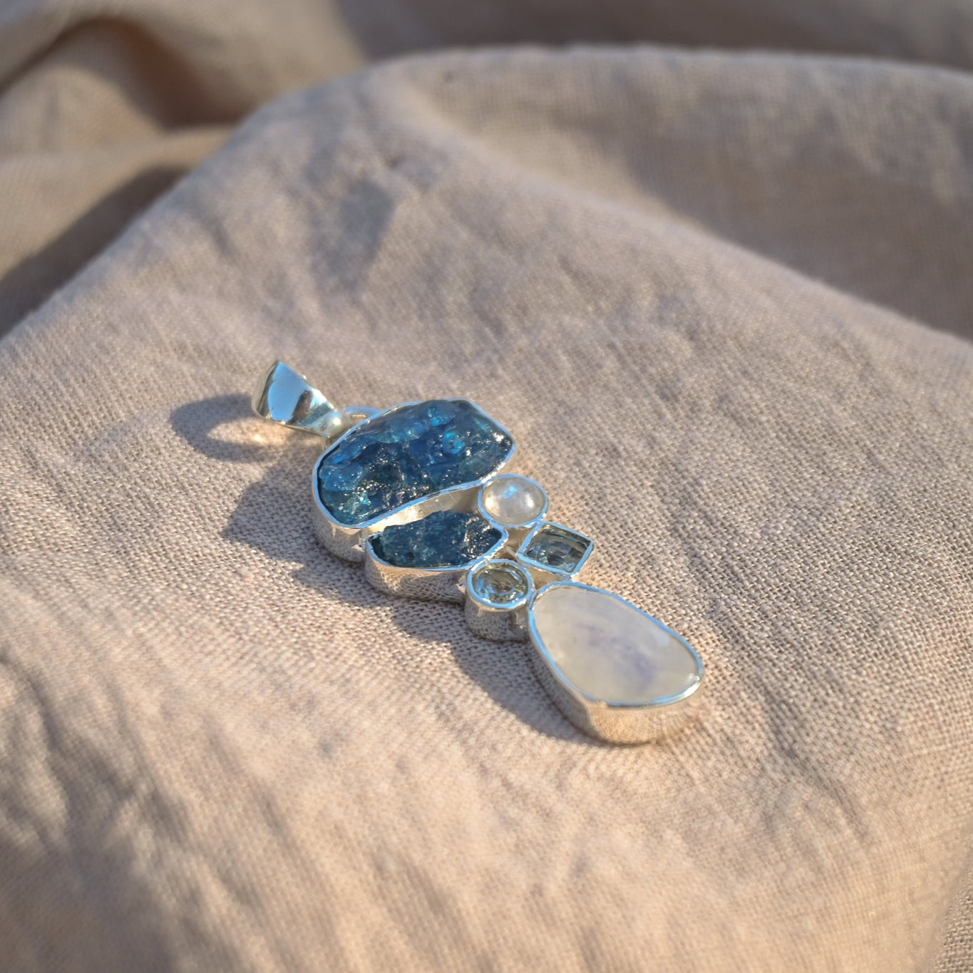 Blue topic and moonstone semi precious stone pendant