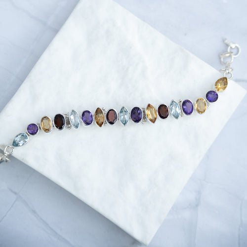 Sterling Silver Multi-Gemstone Adjustable Bracelet – Garnet, Amethyst, Blue Topaz & Citrine