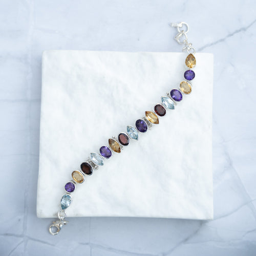 Sterling Silver Multi-Gemstone Adjustable Bracelet – Garnet, Amethyst, Blue Topaz & Citrine