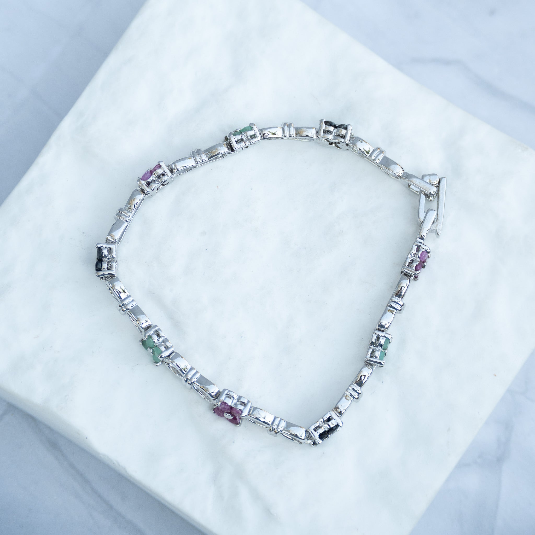 Sterling Silver Multi-Gemstone Flower Tennis Bracelet – Pink Ruby, Blue Sapphire & Light Emerald