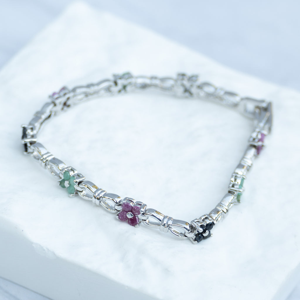 Sterling Silver Multi-Gemstone Flower Tennis Bracelet – Pink Ruby, Blue Sapphire & Light Emerald