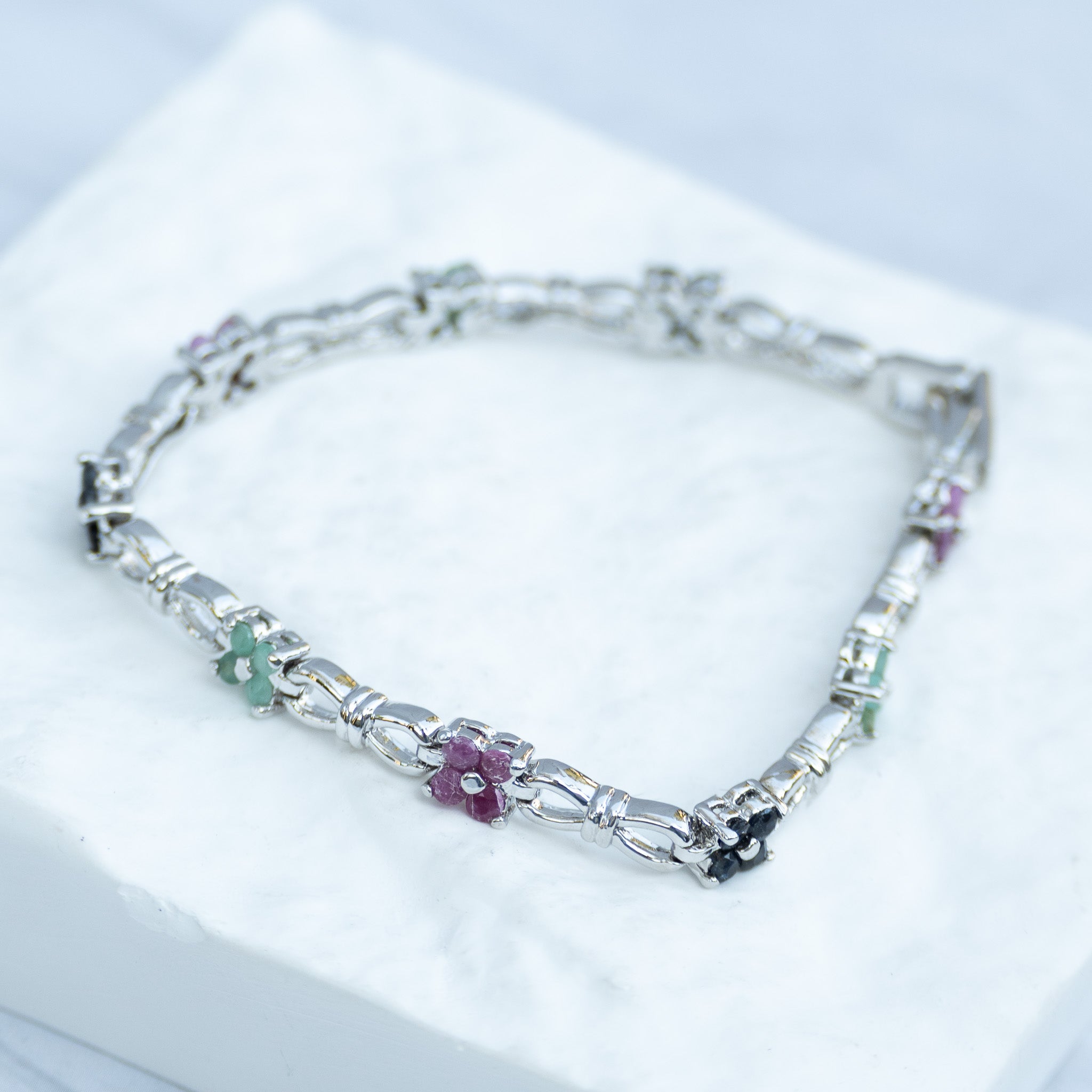 Sterling Silver Multi-Gemstone Flower Tennis Bracelet – Pink Ruby, Blue Sapphire & Light Emerald