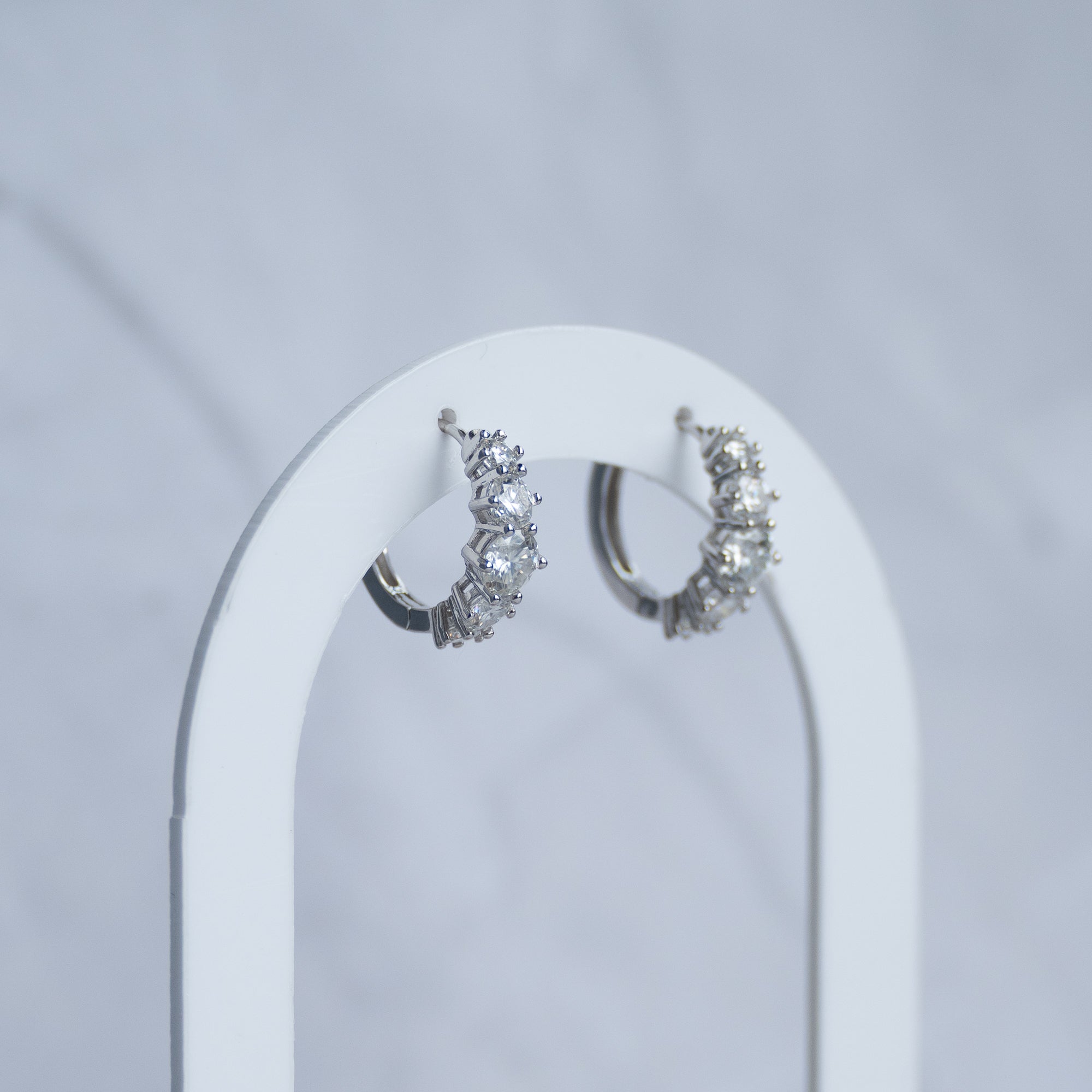 Five Moissanite huggy earrings