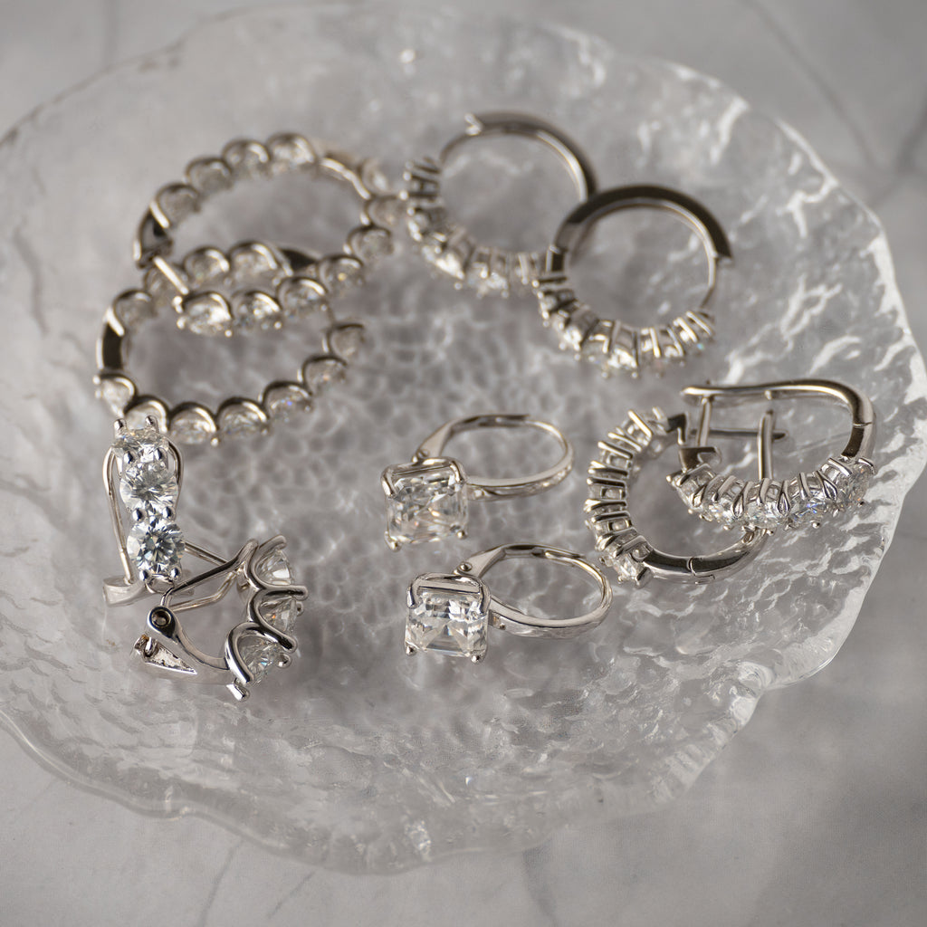 Five Moissanite huggy earrings