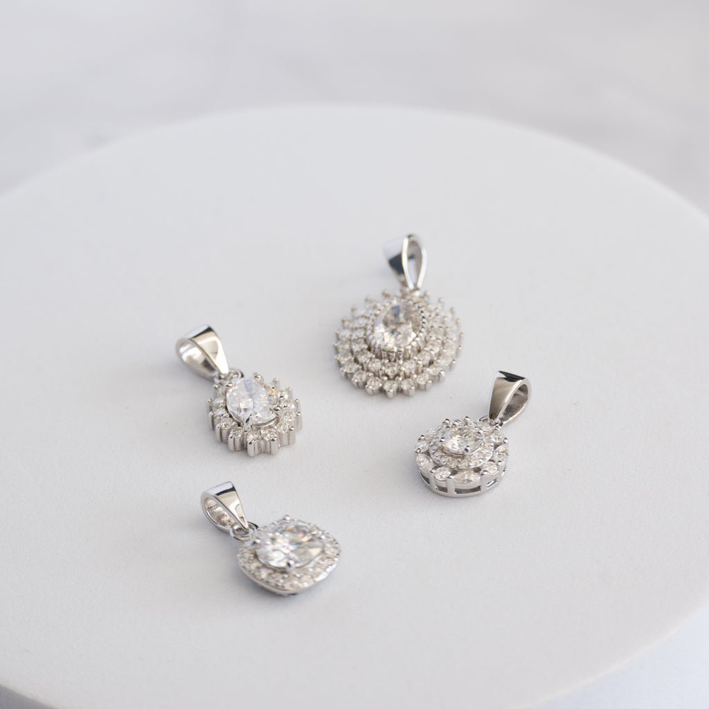 Sterling Silver Teardrop Cluster Moissanite Pendant – 1ct Oval Centre Stone