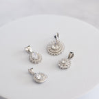 Sterling Silver Teardrop Cluster Moissanite Pendant – 1ct Oval Centre Stone