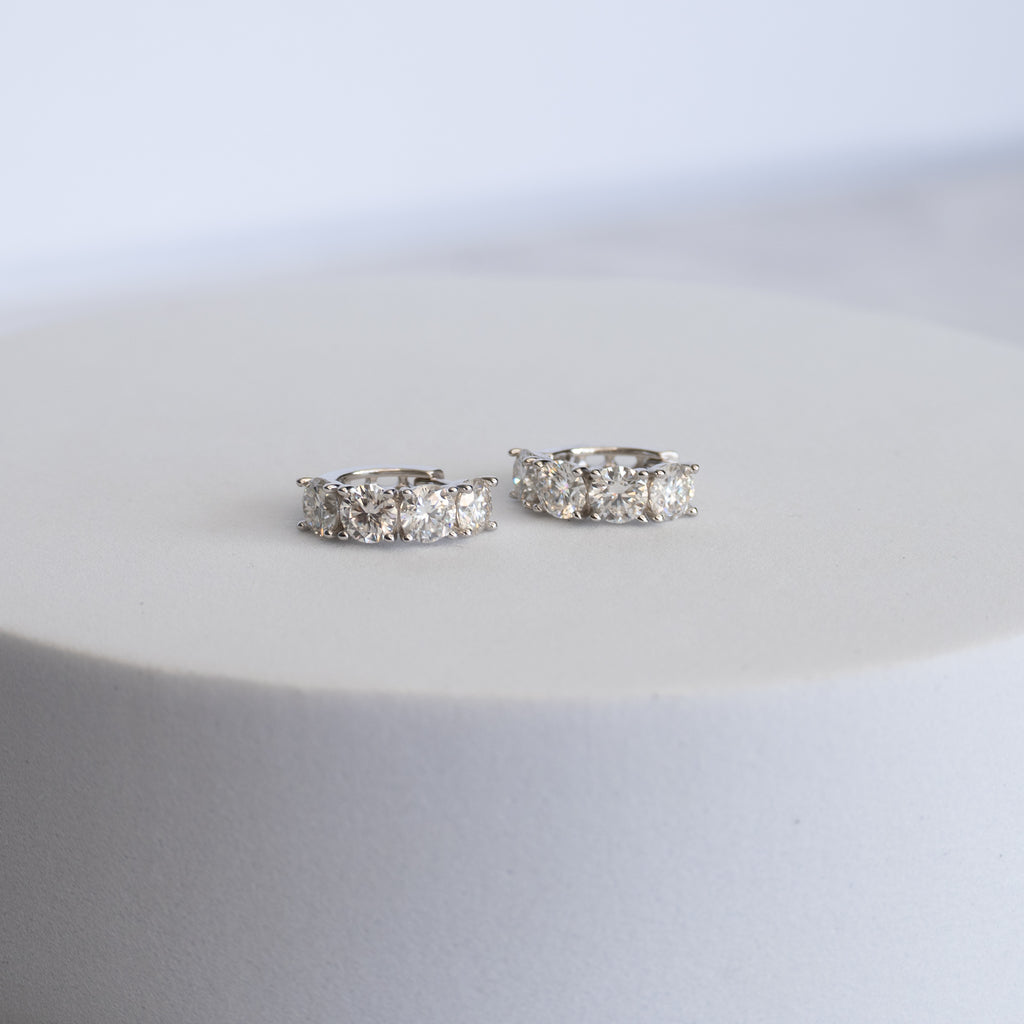 Sterling Silver Four-Stone Moissanite Huggie Earrings
