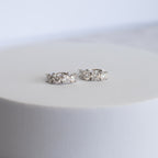 Sterling Silver Four-Stone Moissanite Huggie Earrings