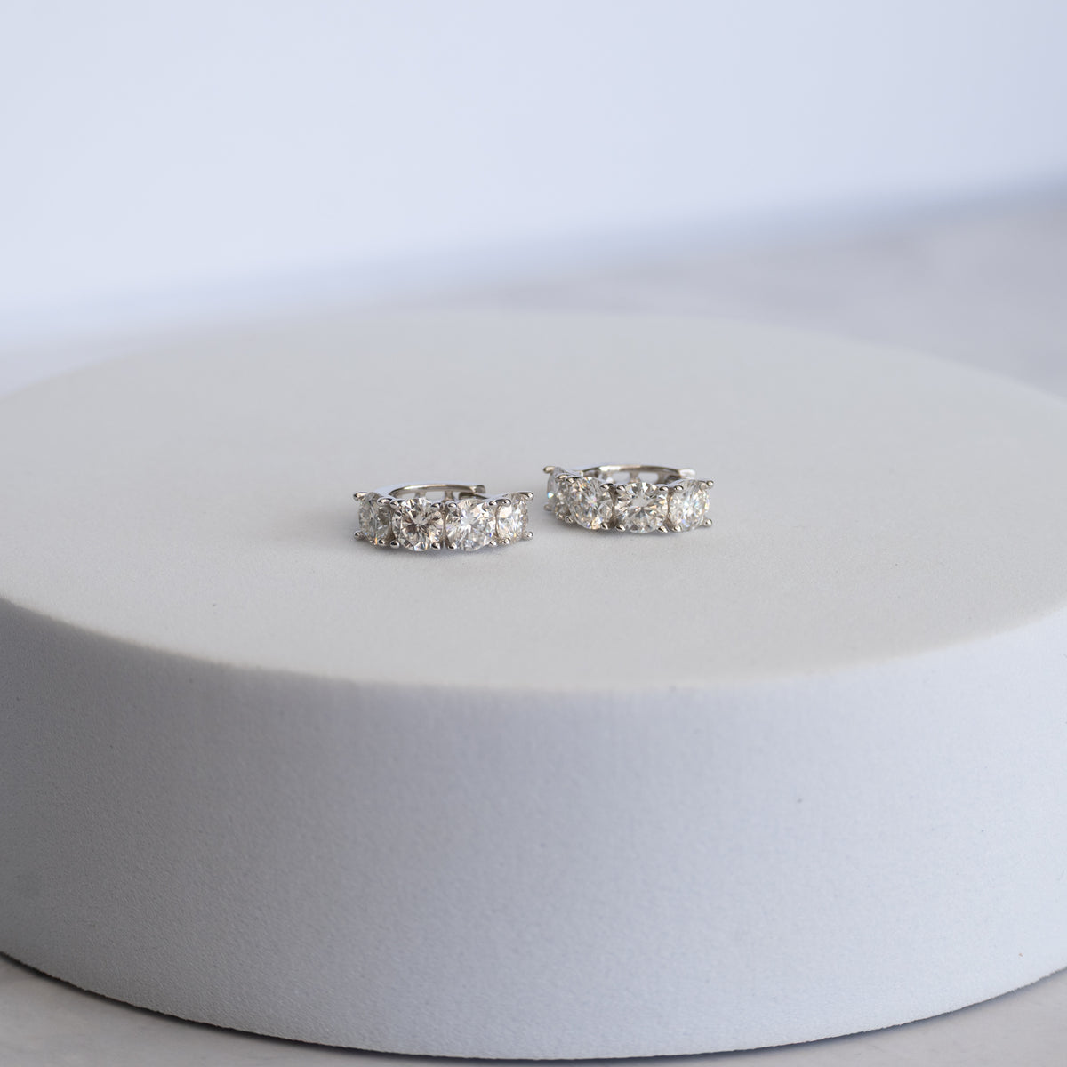 Sterling Silver Four-Stone Moissanite Huggie Earrings