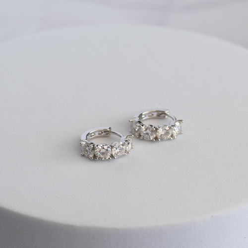 Sterling Silver Four-Stone Moissanite Huggie Earrings