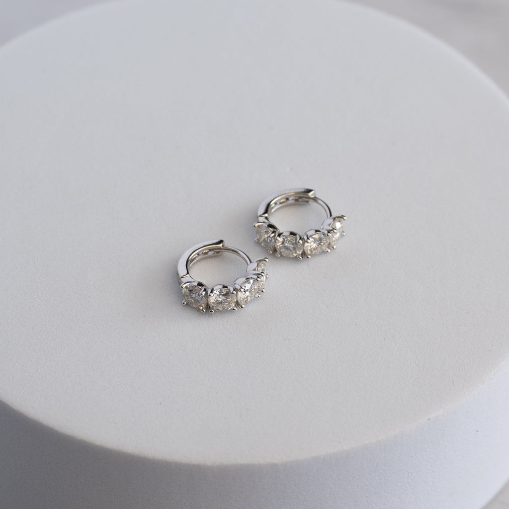 Sterling Silver Four-Stone Moissanite Huggie Earrings