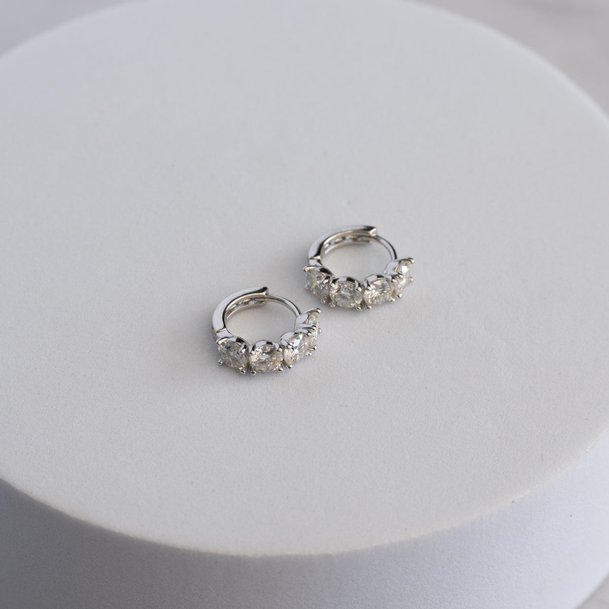 Sterling Silver Four-Stone Moissanite Huggie Earrings