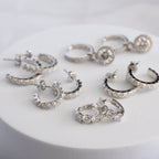 Sterling Silver Four-Stone Moissanite Huggie Earrings