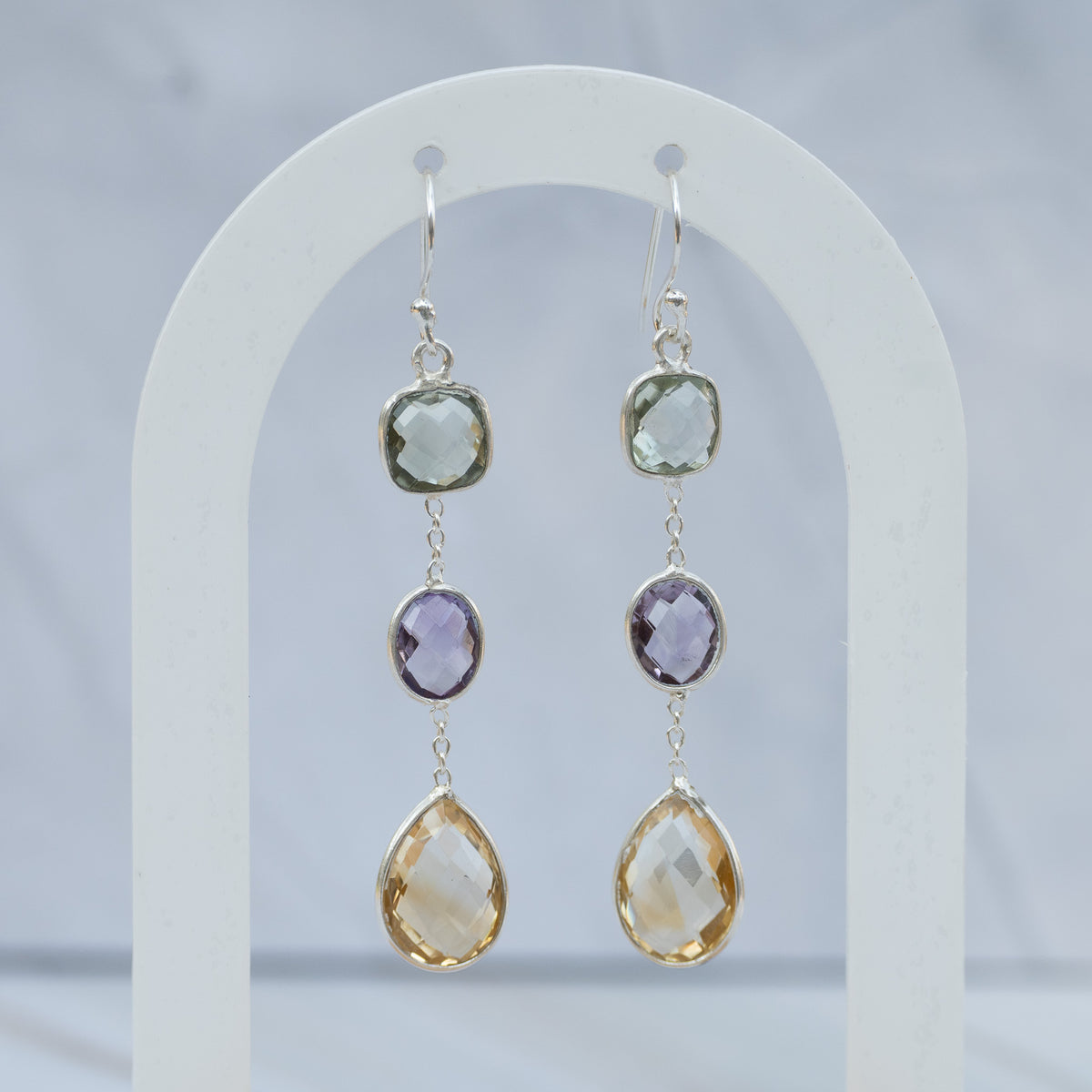 Three semi precious stone drop earrings