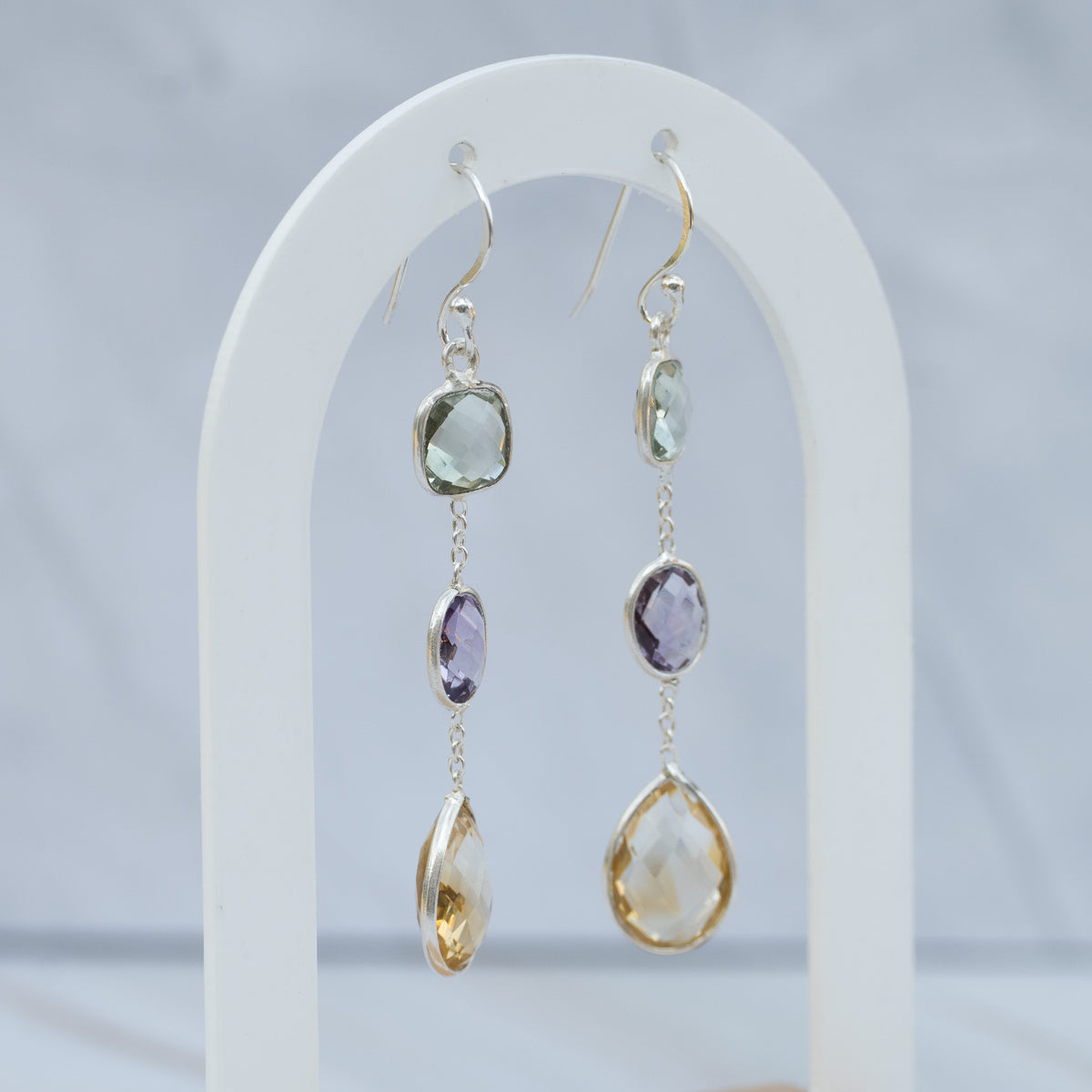 Three semi precious stone drop earrings