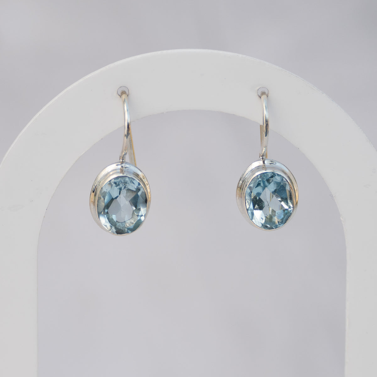 Sterling Silver Oval Blue Topaz Drop Earrings – 23mm
