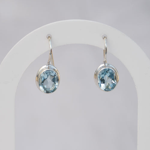 Sterling Silver Oval Blue Topaz Drop Earrings – 23mm