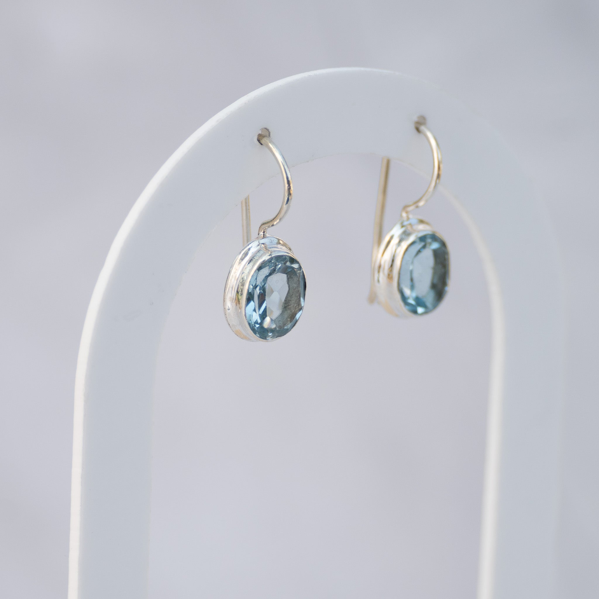 Sterling Silver Oval Blue Topaz Drop Earrings – 23mm