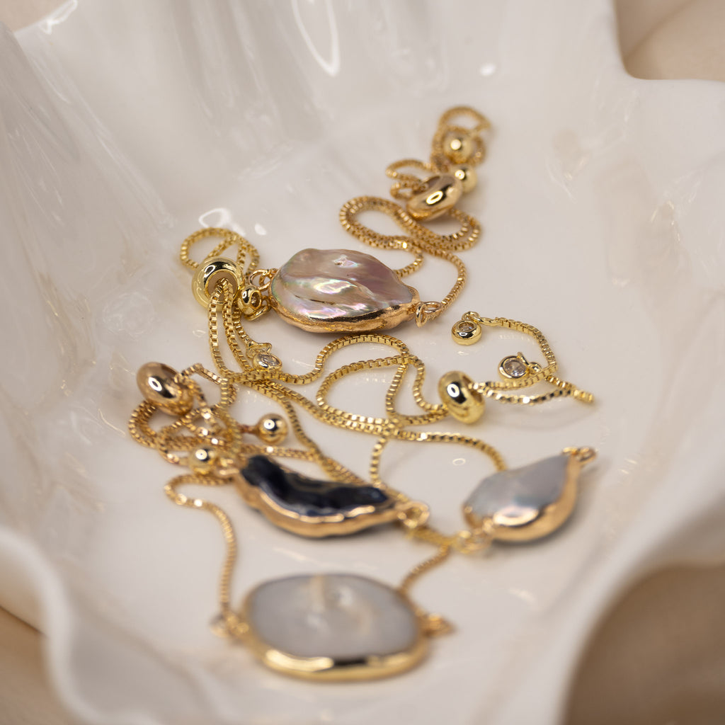 Gold Adjustable Pear shaped Pearl bracelet