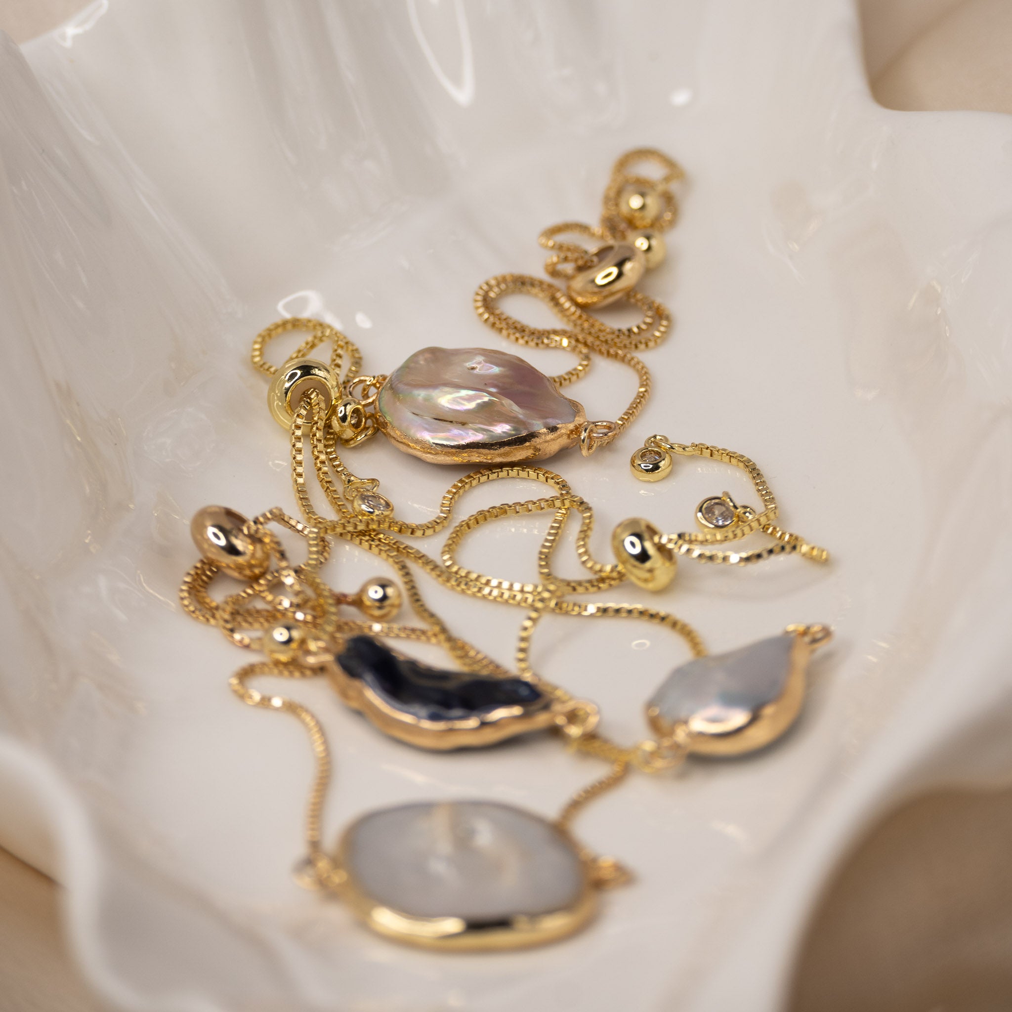 Gold Adjustable Pear shaped Pearl bracelet