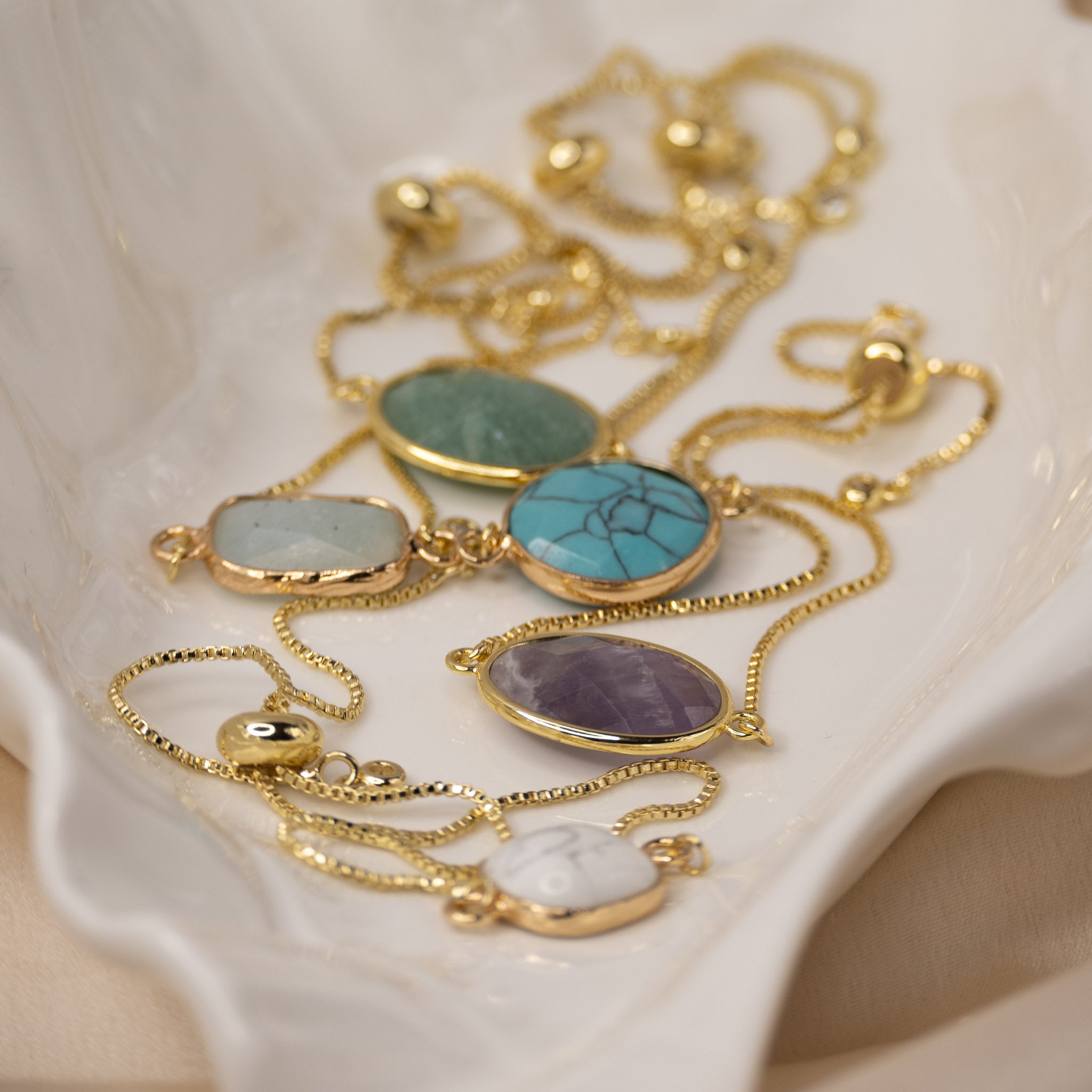 Adjustable Gold bracelet with a Howlite semi precious stone