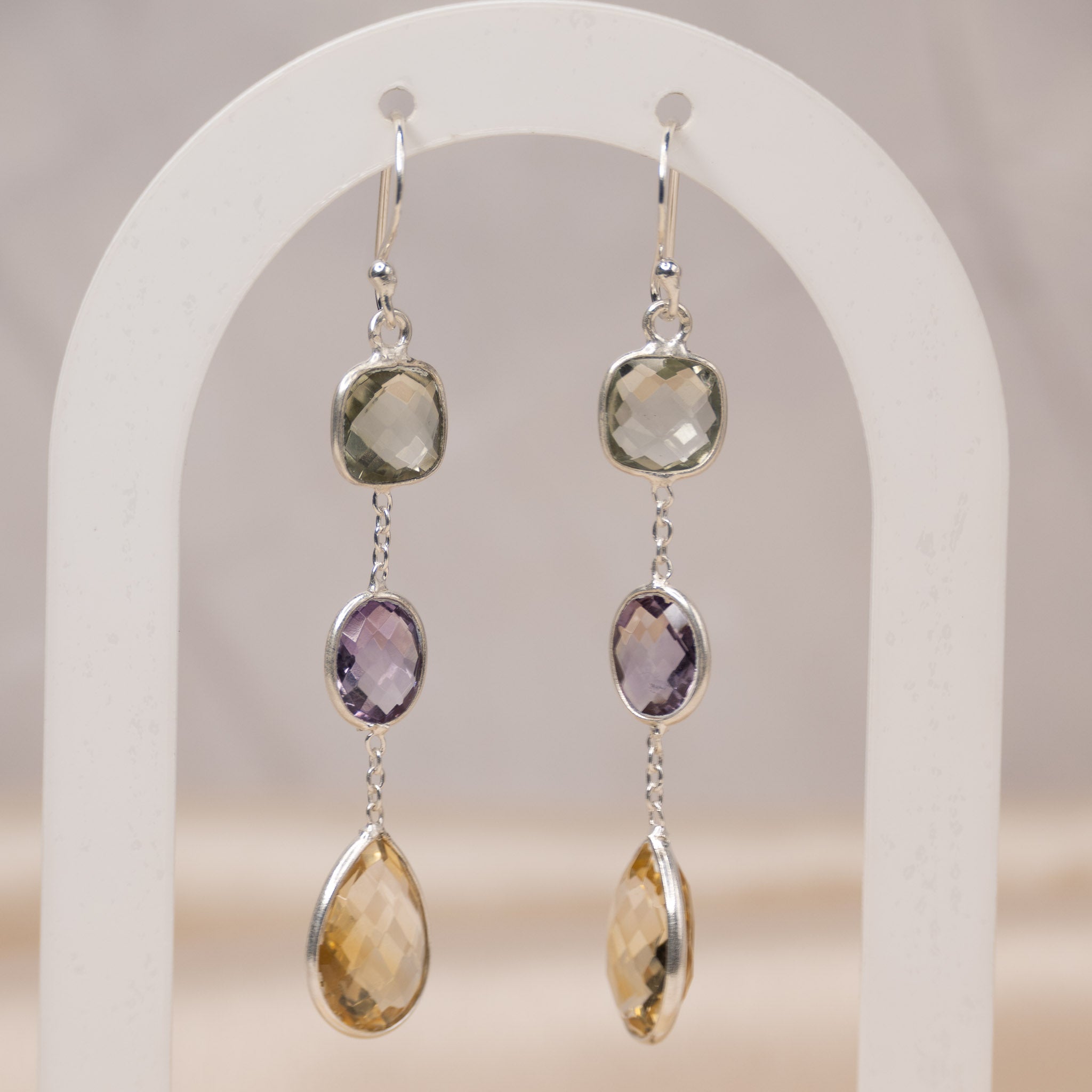 Three semi precious stone drop earrings