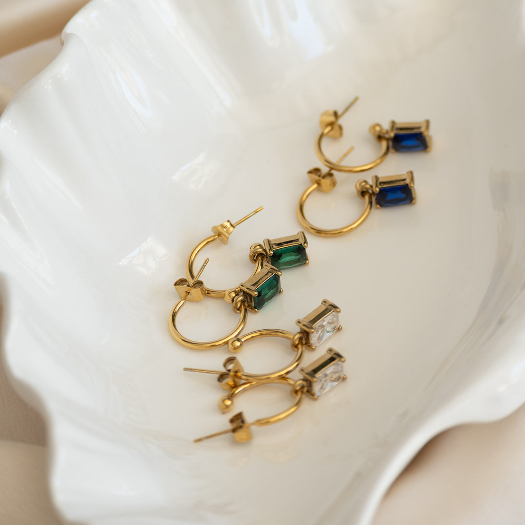 Gold pretty woman earrings with Blue Charms