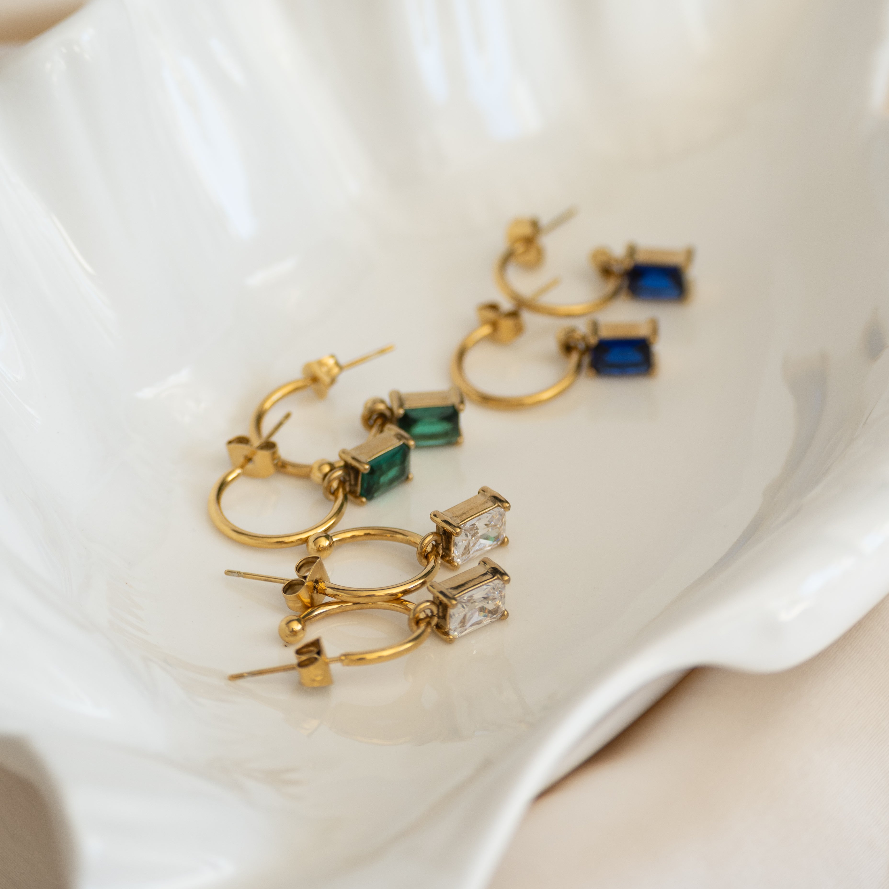 Gold pretty woman hoops with green charms to add to earrings