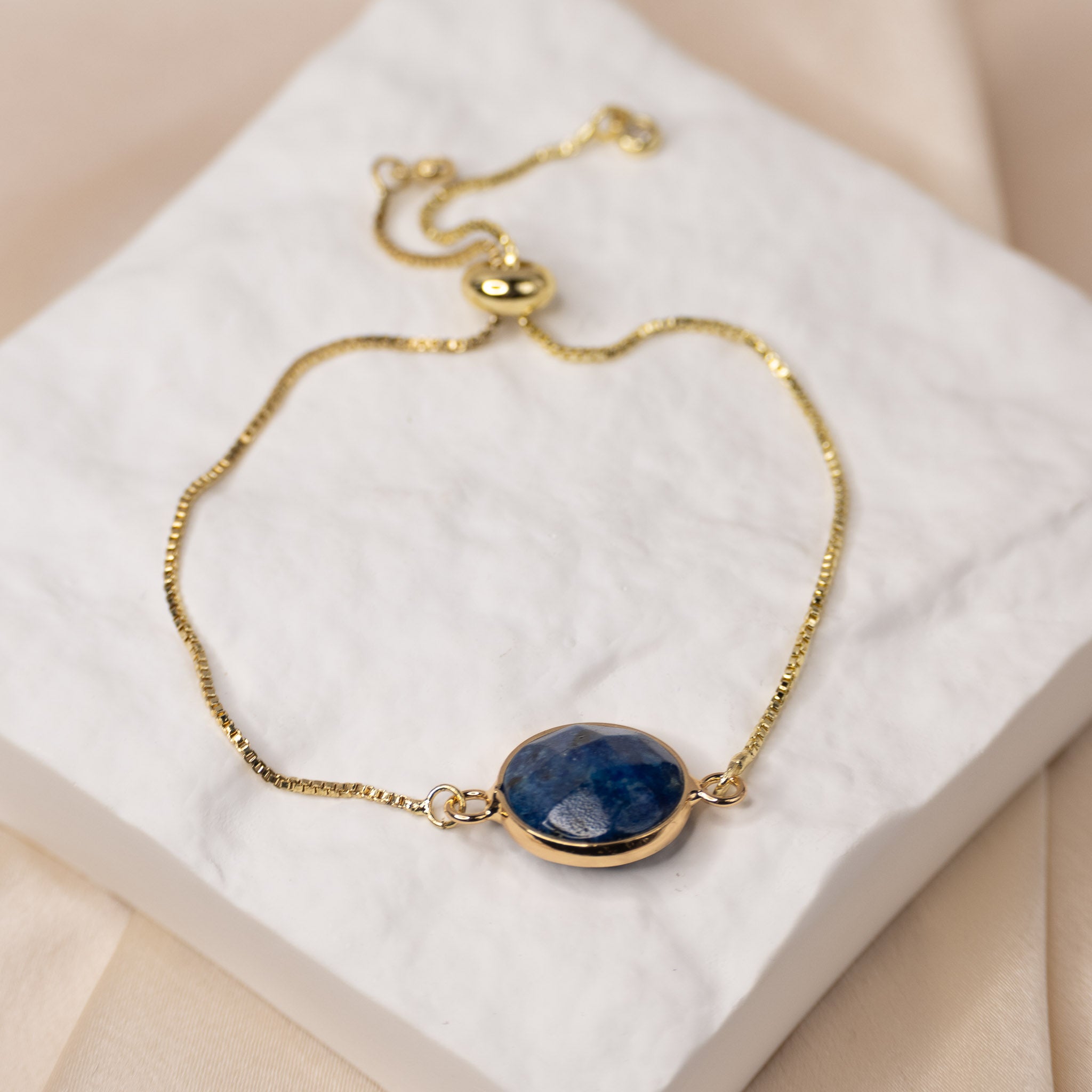 Gold Adjustable bracelet with Round Lapis Lazuli Semi precious stone