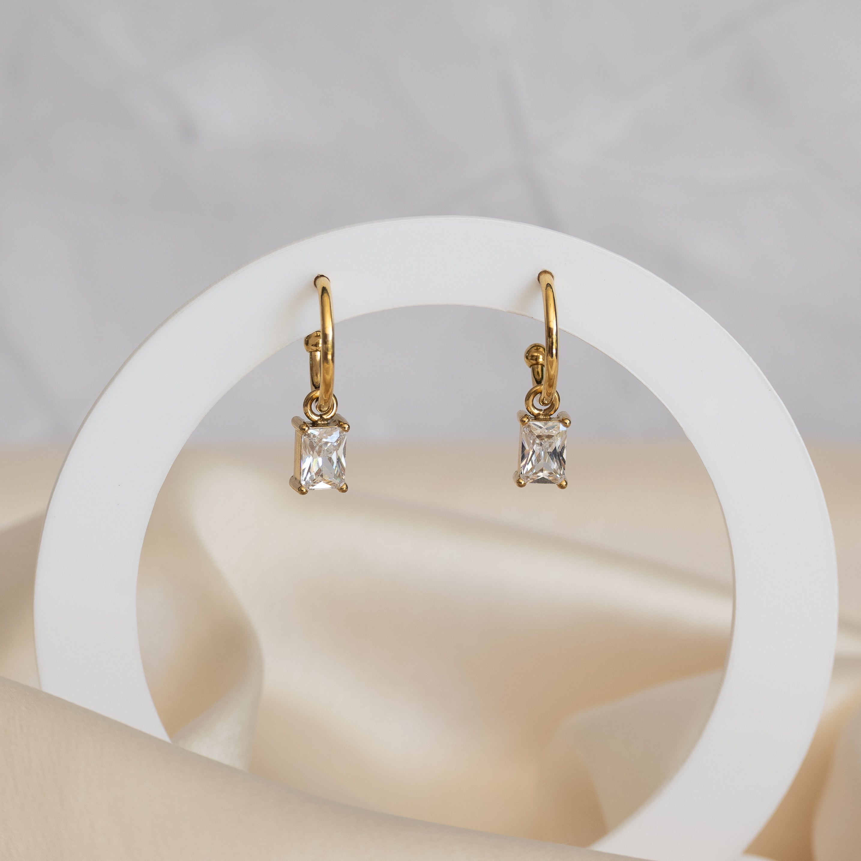 Gold pretty woman earrings with rectangular clear charms