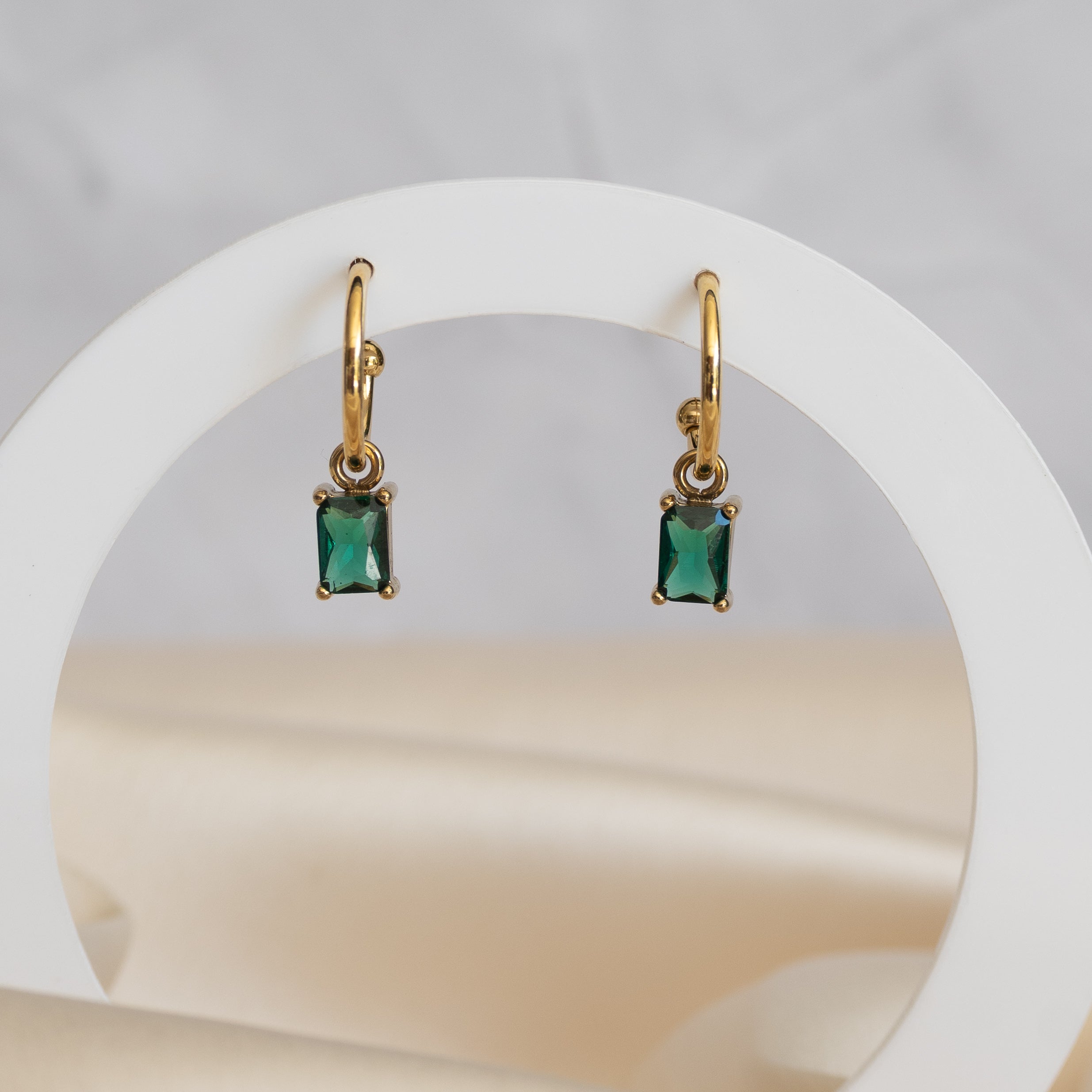 Gold pretty woman hoops with green charms to add to earrings