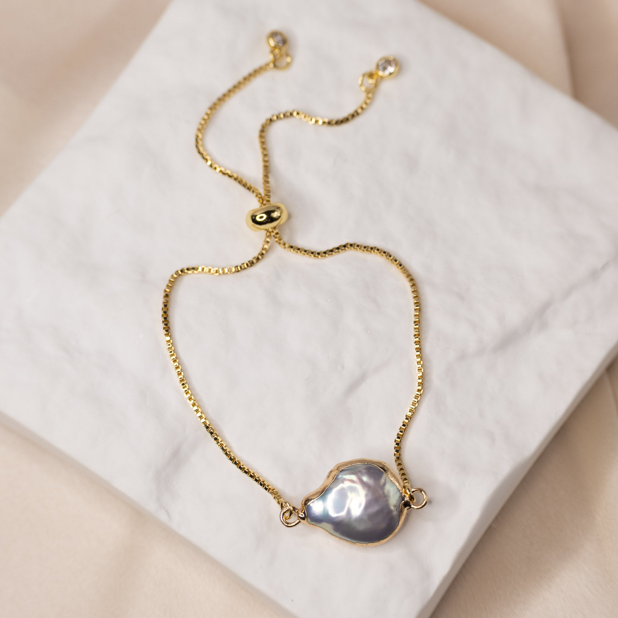 Gold Adjustable Pear shaped Pearl bracelet