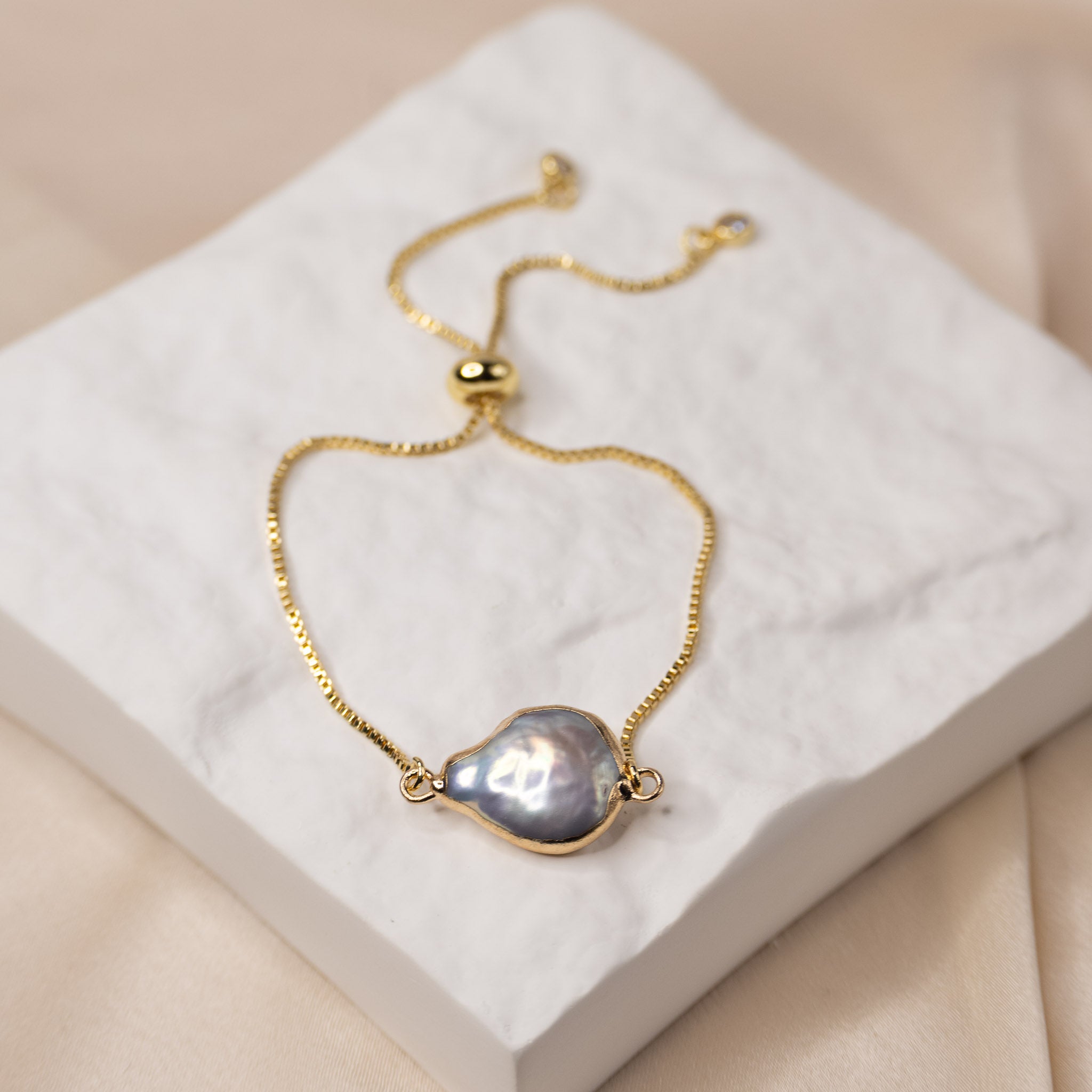 Gold Adjustable Pear shaped Pearl bracelet
