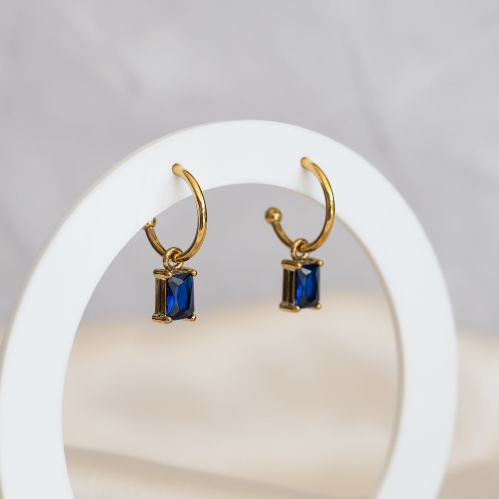 Gold pretty woman earrings with Blue Charms