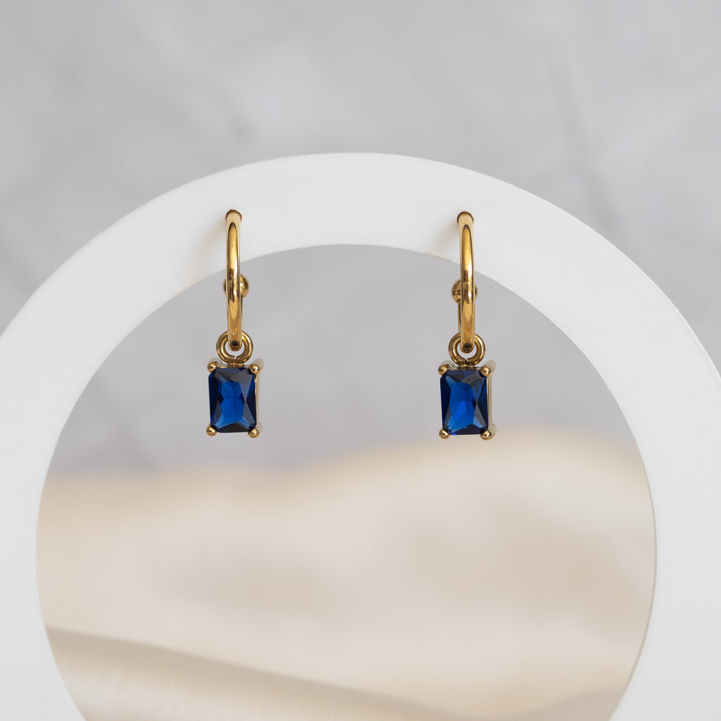 Gold pretty woman earrings with Blue Charms