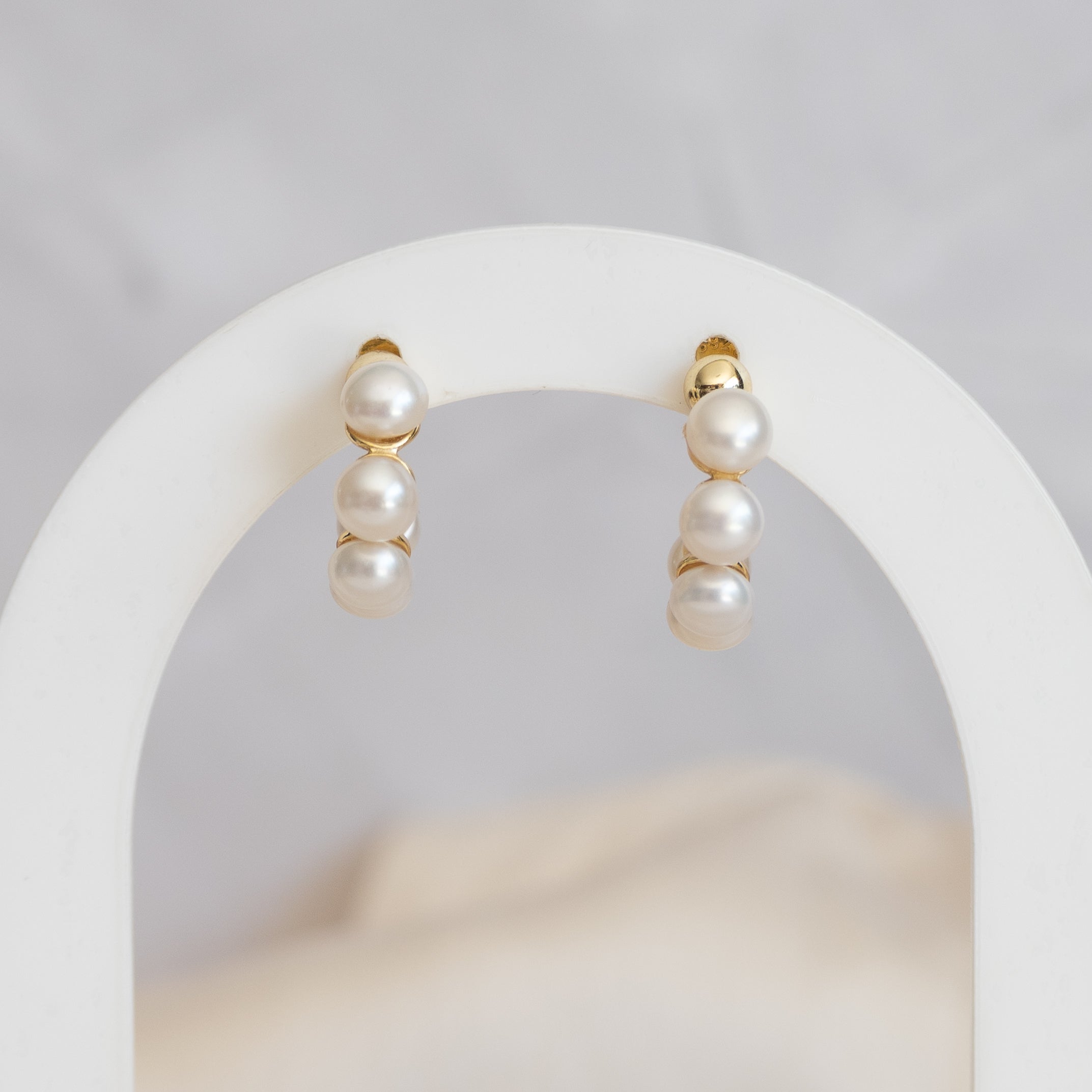 Gold pearl hoop earrings