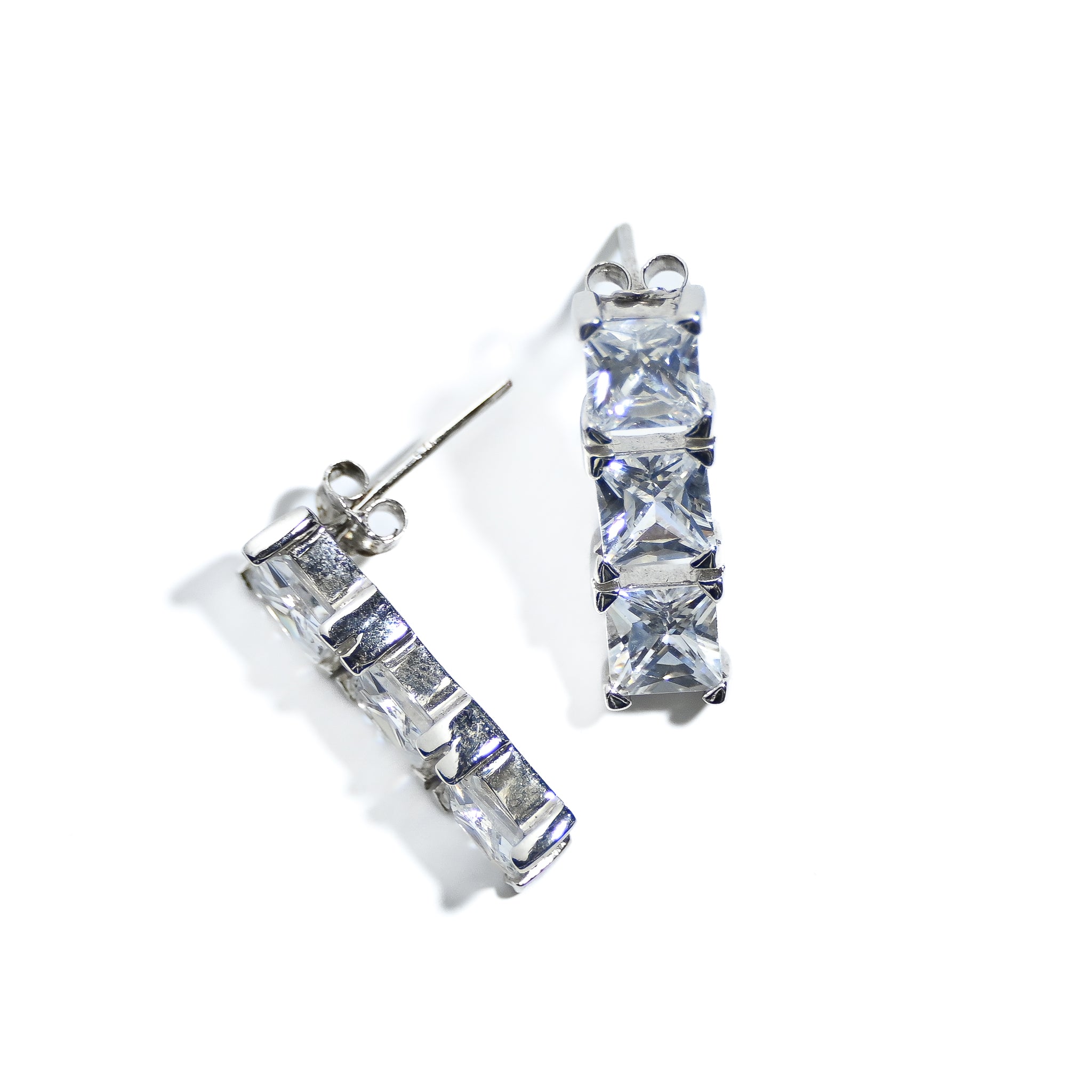 Stunning Three Stone Stud Earrings In Modern Setting