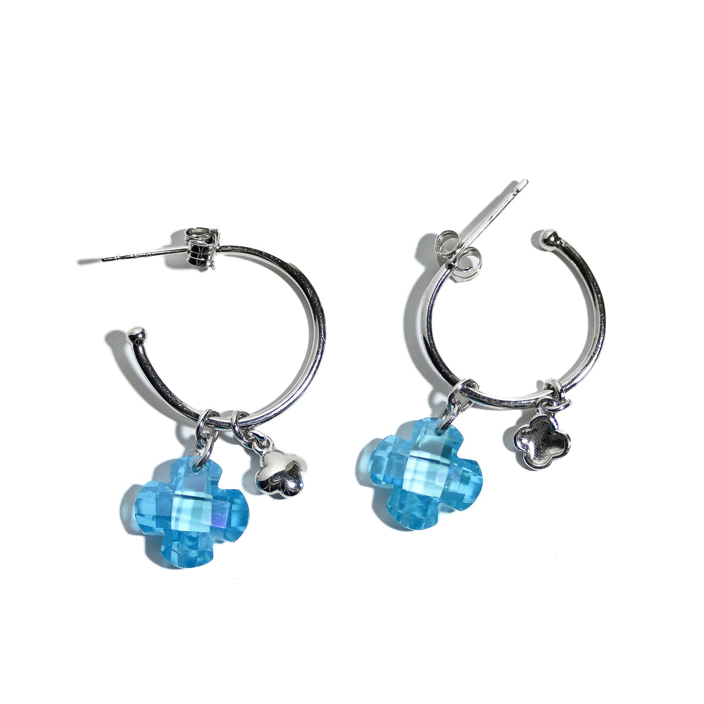 Sterling silver rhodium plated pretty woman earrings with blue stone charms